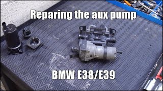 How to repair auxiliary coolant pump BMW E38E39 [upl. by Greenberg320]